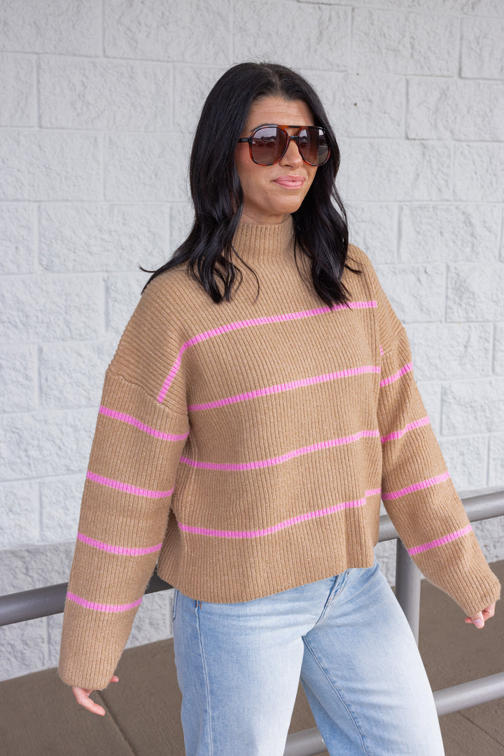 Women's taupe ribbed knit sweater with pink stripes by Wishlist showing slight side view