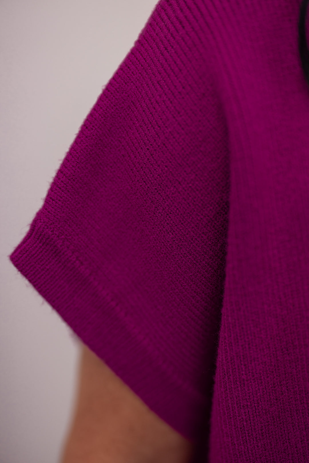 Women's magenta short sleeve mock neck top with drop shoulder by Jodifl showing ribbed knit details