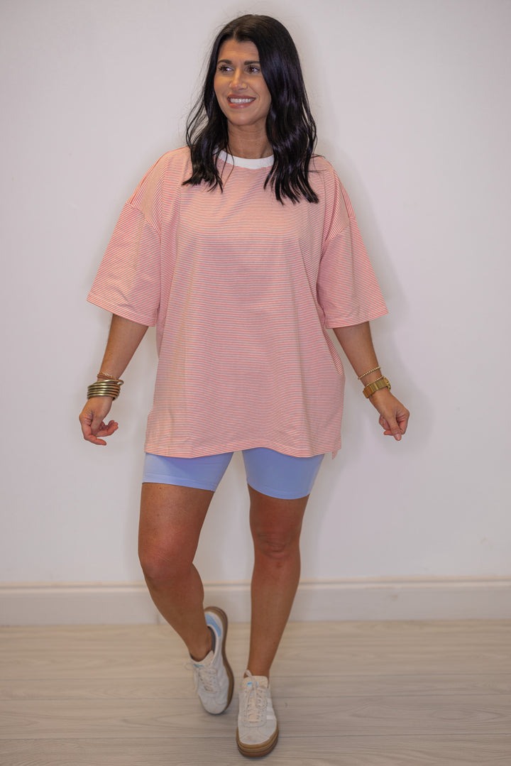 Women's coral and white striped knit oversized top, perfect for women of all ages