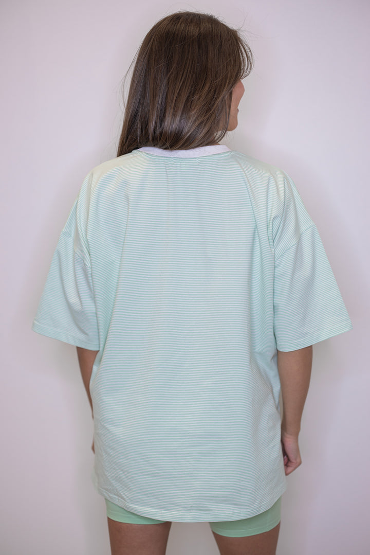 Women's mint green and white striped knit oversized top by Wishlist showing up close back view