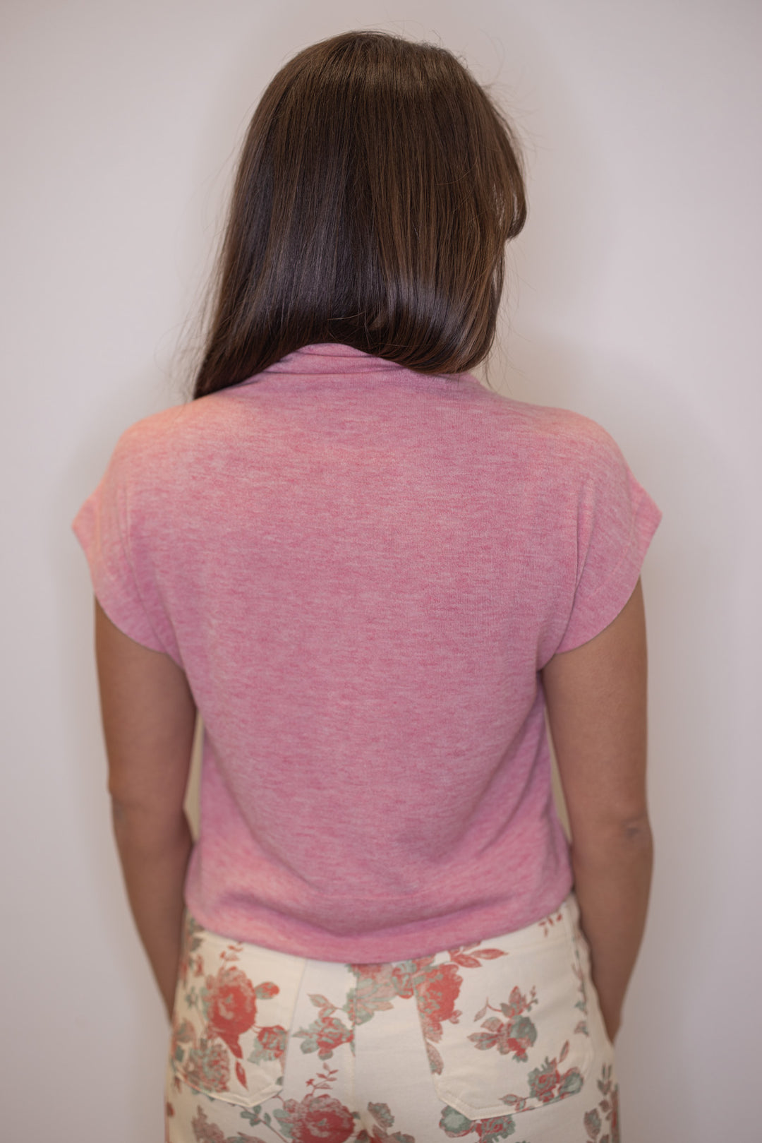 Women's pink knit top by Entro showing up close back view