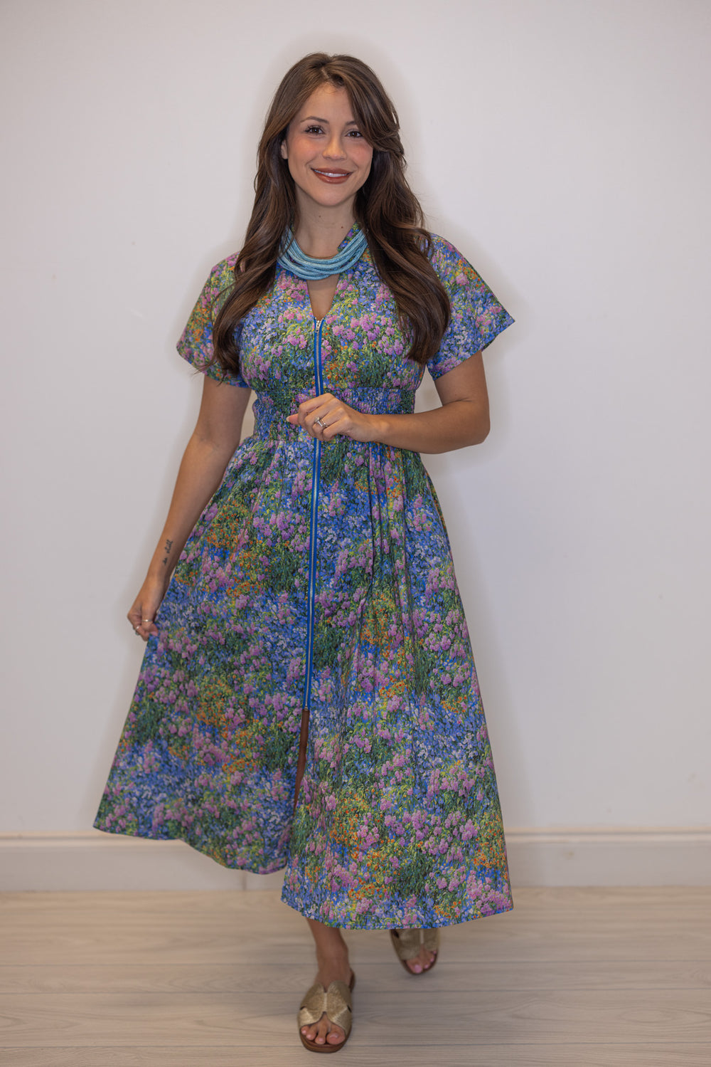 Women's blue multicolor floral midi dress  by Entro, perfect for Easter