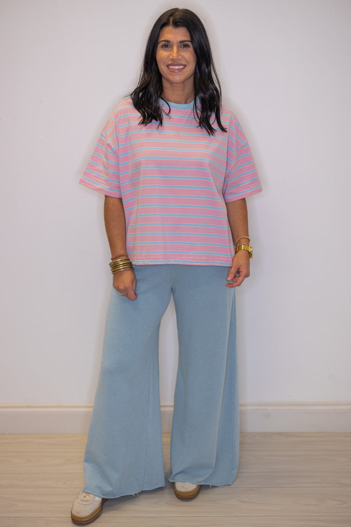 Women's pink and sky blue striped knit top, great for teachers