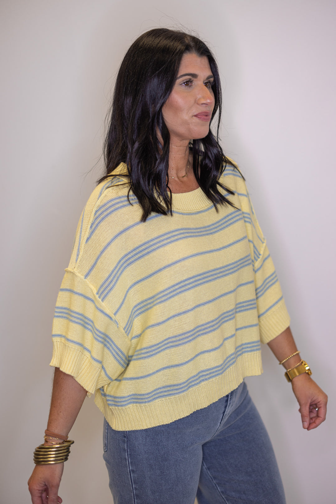 Women's lightweight lemon yellow sweater knit top with light blue stripes