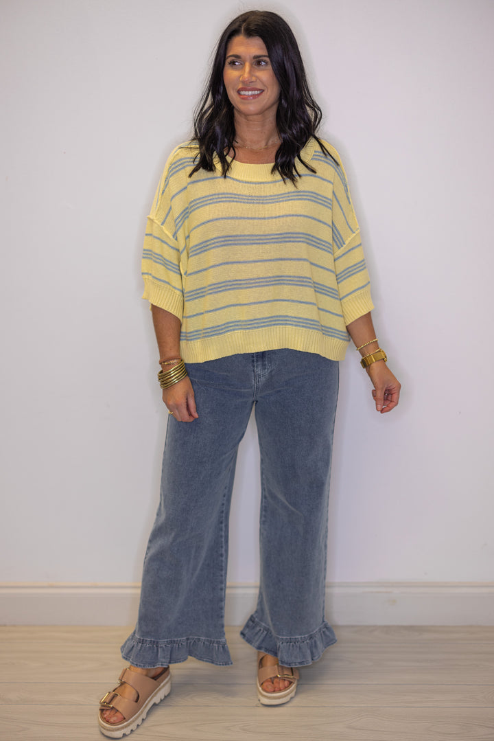 Women's lemon yellow sweater knit top with light blue stripes, great for warmer weather