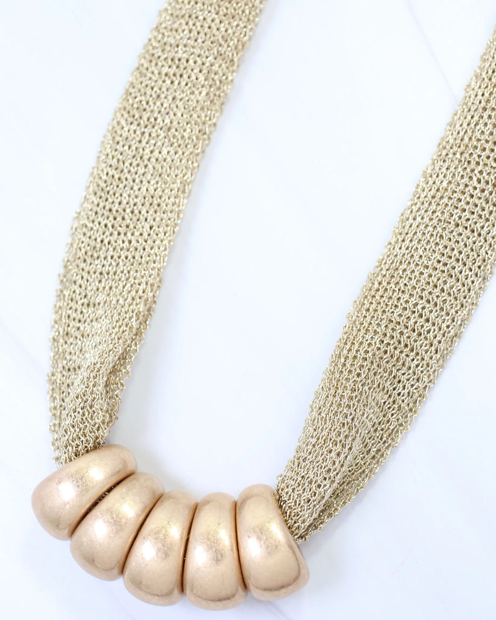 gold beaded statement necklace