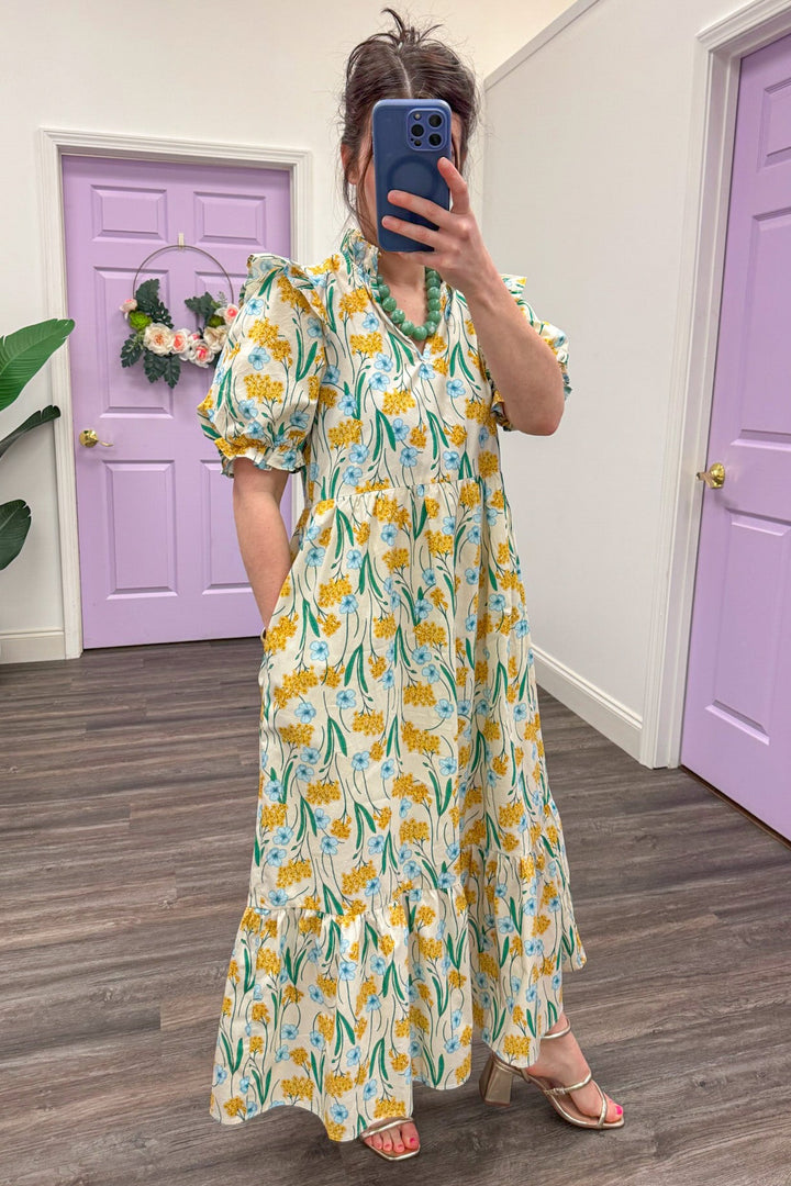 yellow and blue floral ruffled puff sleeve cream midi dress side pockets
