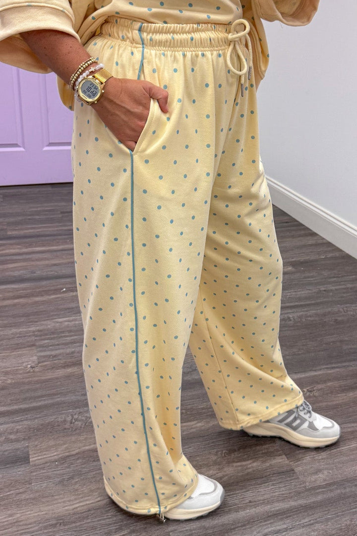 washed butter yellow with light blue polka dots wide leg knit jogger pants with front pockets