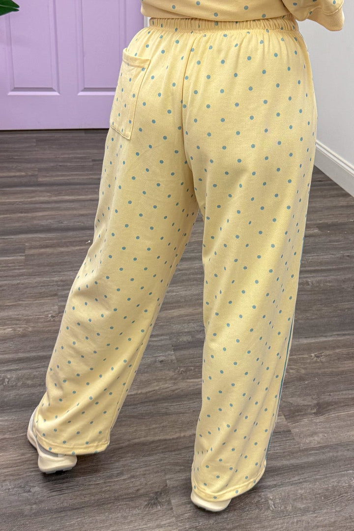 washed butter yellow with light blue polka dots wide leg knit jogger pants with one back pocket