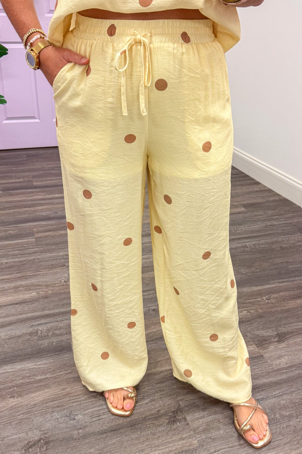 pale yellow with light brown polka dot print wide leg pants with front pockets
