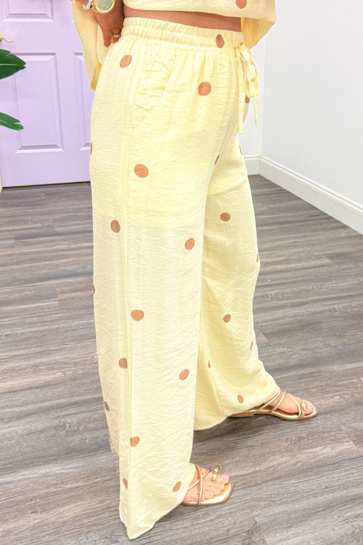 pale yellow with light brown polka dot print shorts lined wide leg pants