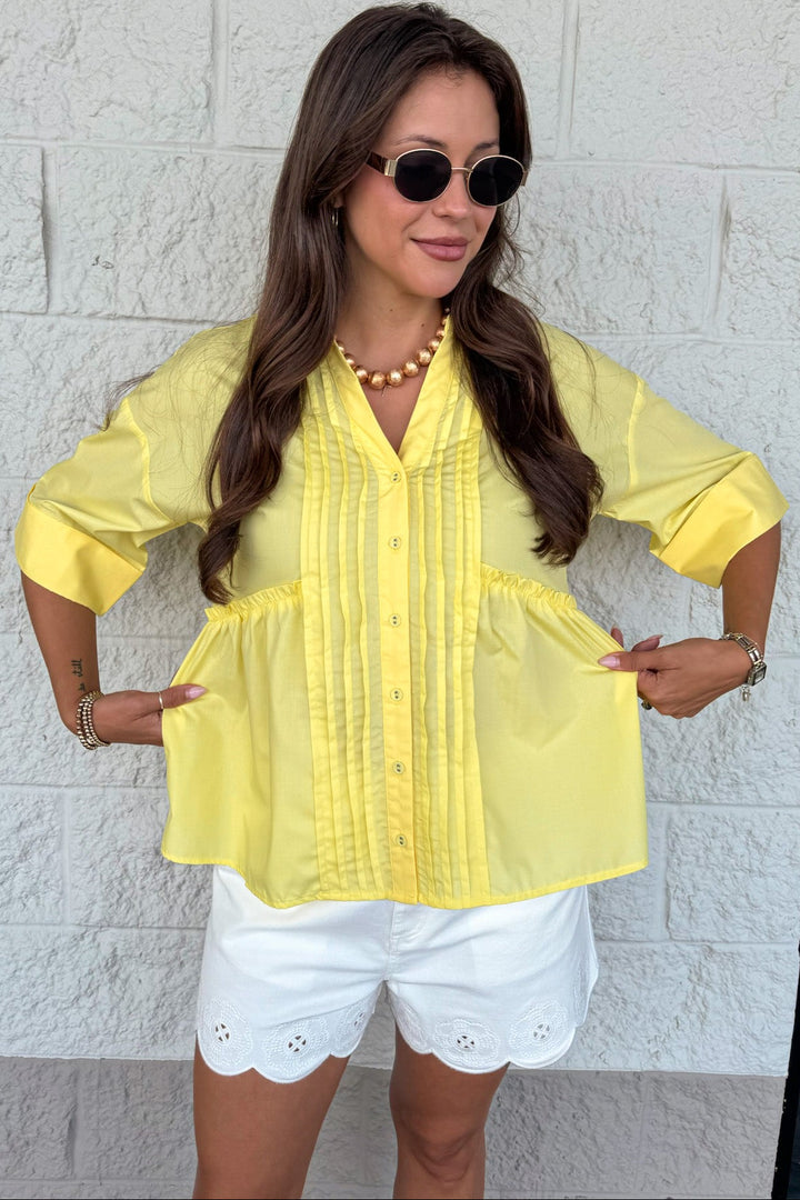 solid yellow ruched pintuck details button front short sleeve relaxed silhouette top