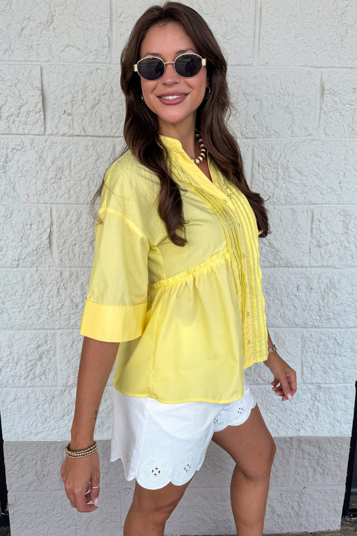 solid yellow ruched pintuck details button front drop shoulder short sleeve top