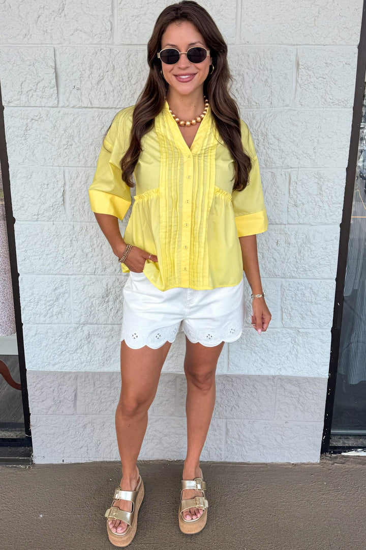 solid yellow ruched pintuck details button front cuffed short sleeve top