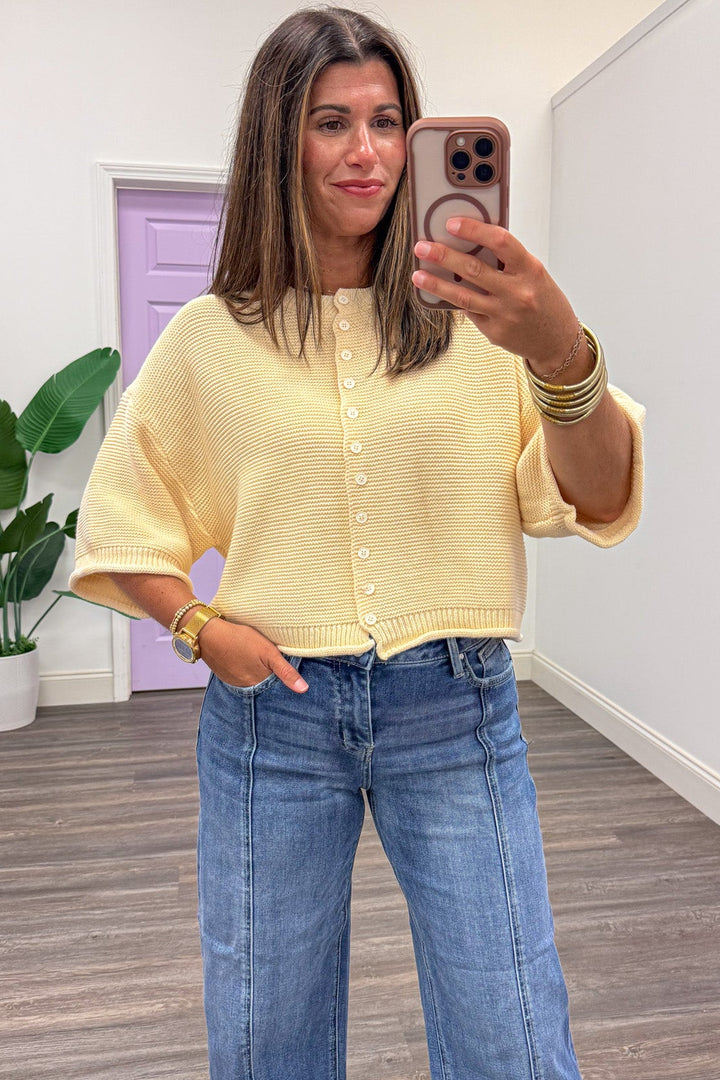 solid butter yellow half sleeve crew neckline button front textured knit cardigan top