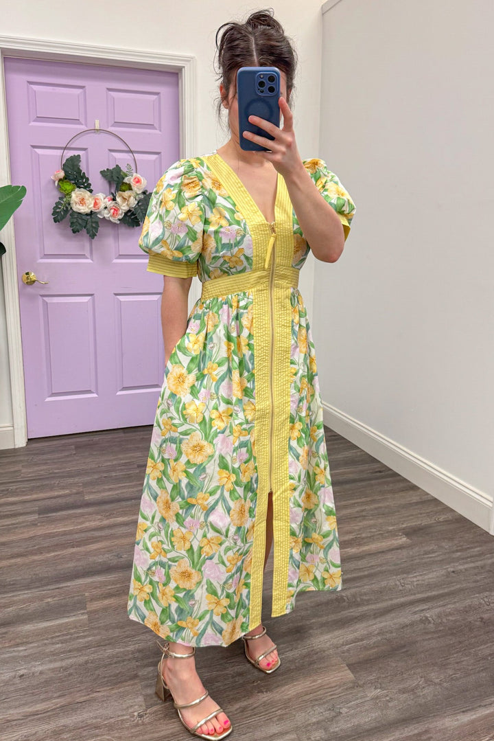 Yellow floral patterned midi dress with side pockets