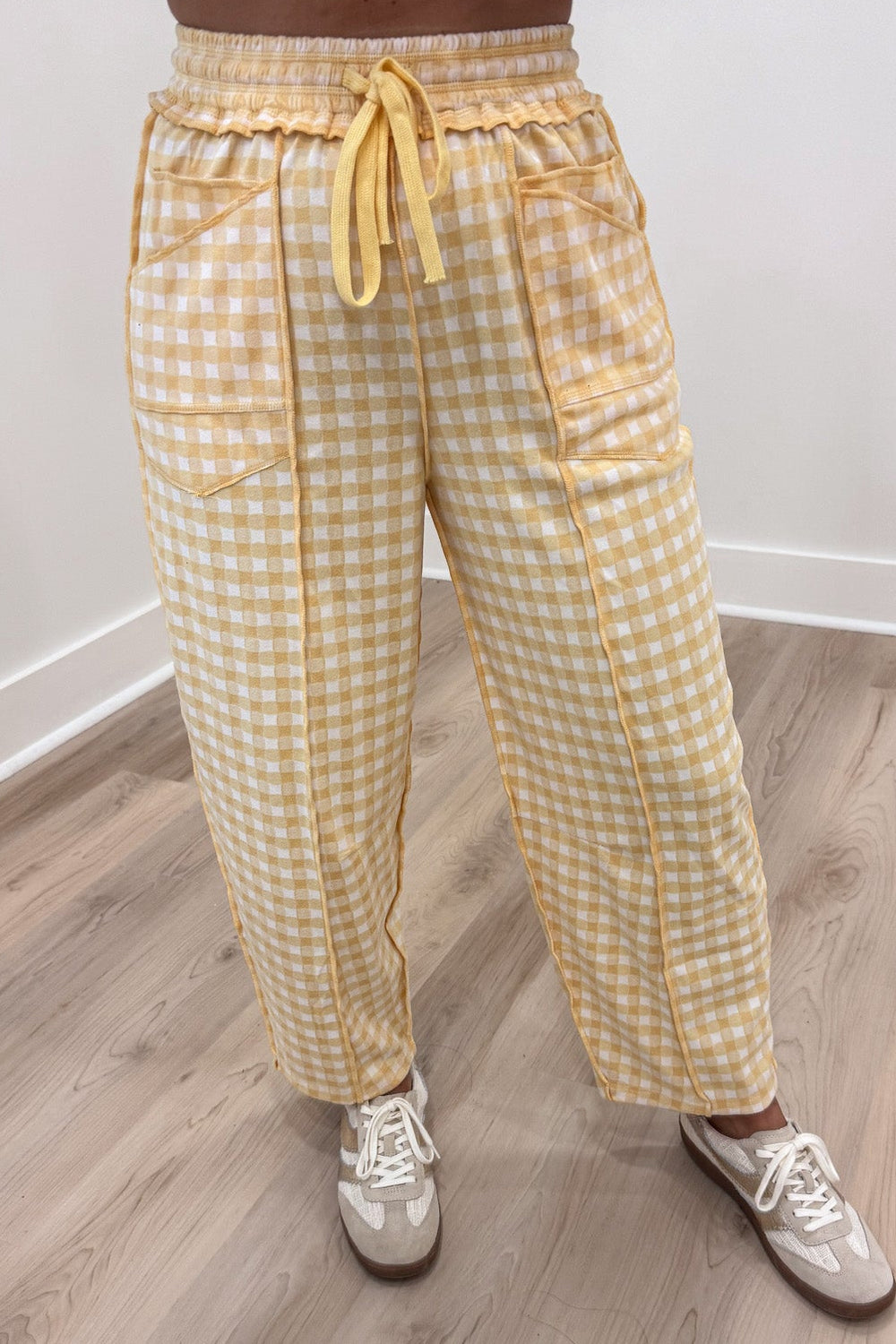 banana yellow and ivory gingham checkered print knit barrel leg pants with reverse seam details