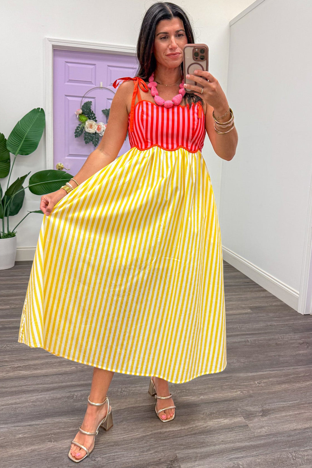 yellow cream coral and pink vertical striped sleeveless midi dress with flowy skirt