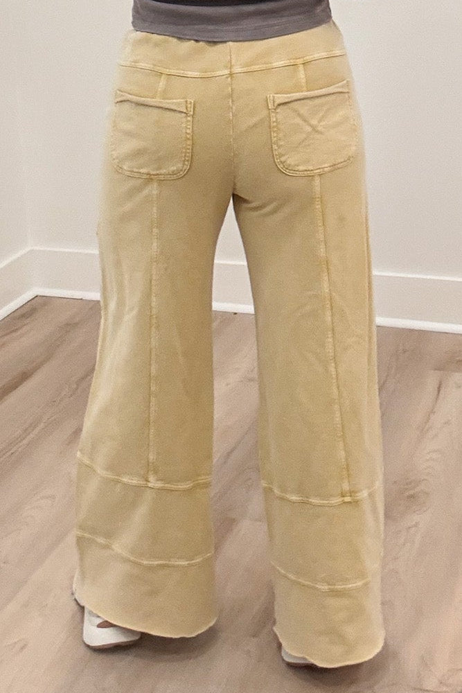 solid butter yellow elastic waist wide leg cargo style french terry knit pants with back pockets